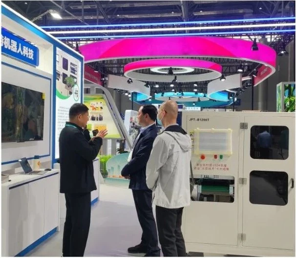AiGRAFT nursery automation equipment displayed at an agricultural exhibition